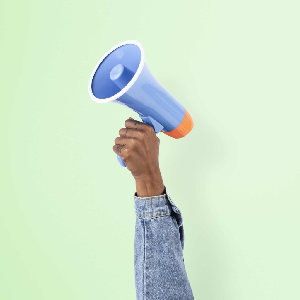 Connect Me Now 1 hand holding megaphone marketing announcement campaign min 1